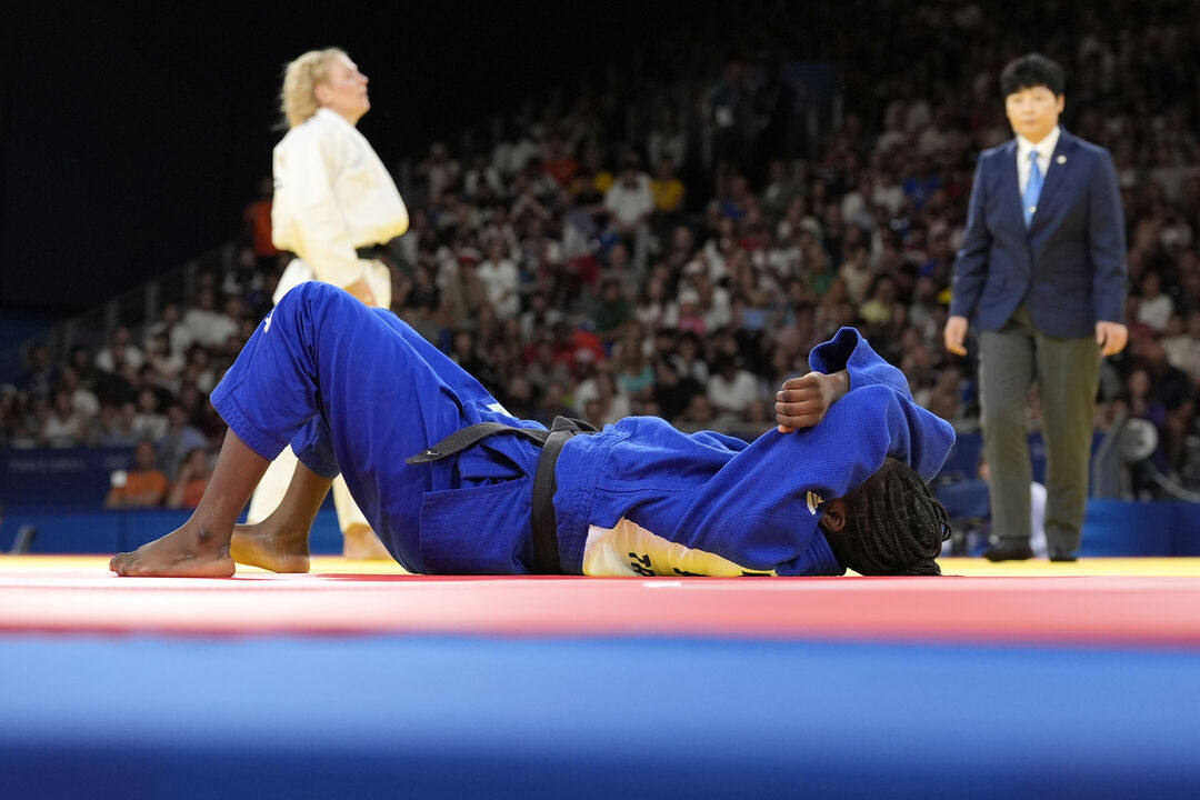 Portugal's Tais Pina reacts after their women -70 kg elimination round match against Italy's Kim Polling in team judo competition