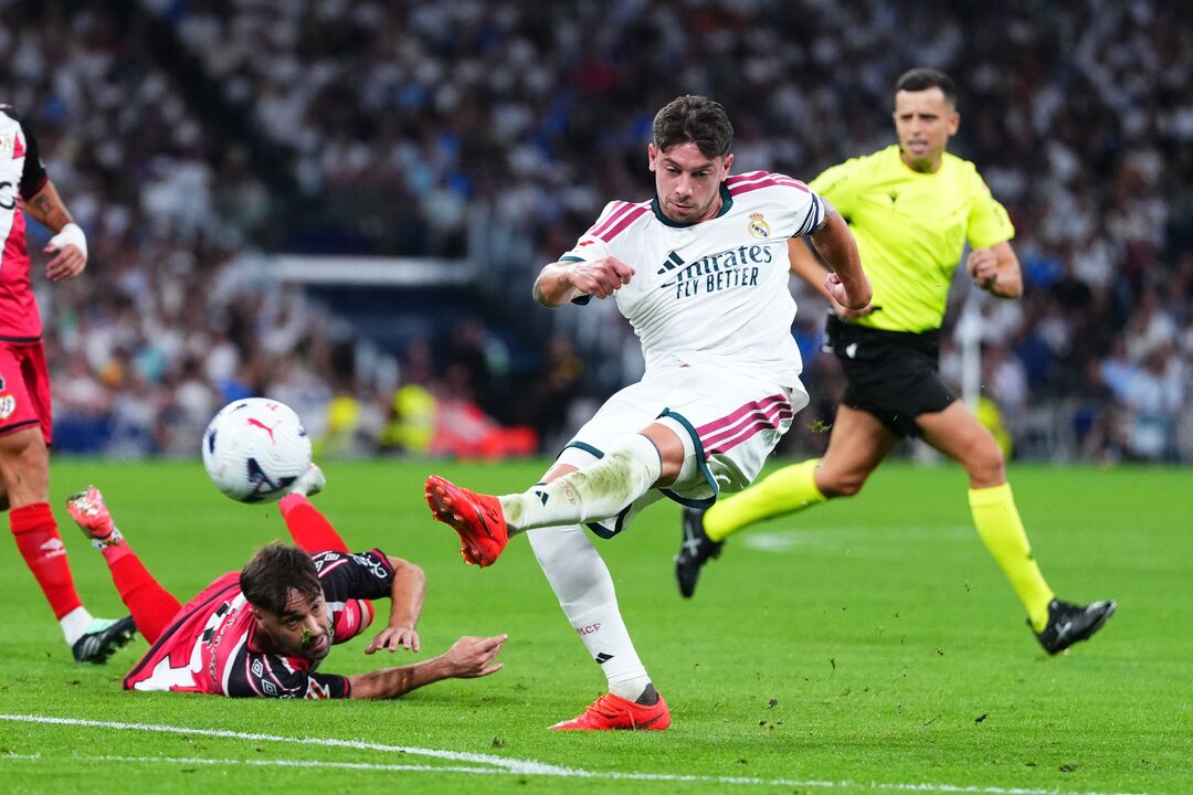 Real Madrid's Federico Valverde attempts a shot on goal during the Spanish La Liga soccer match between Real Madrid and