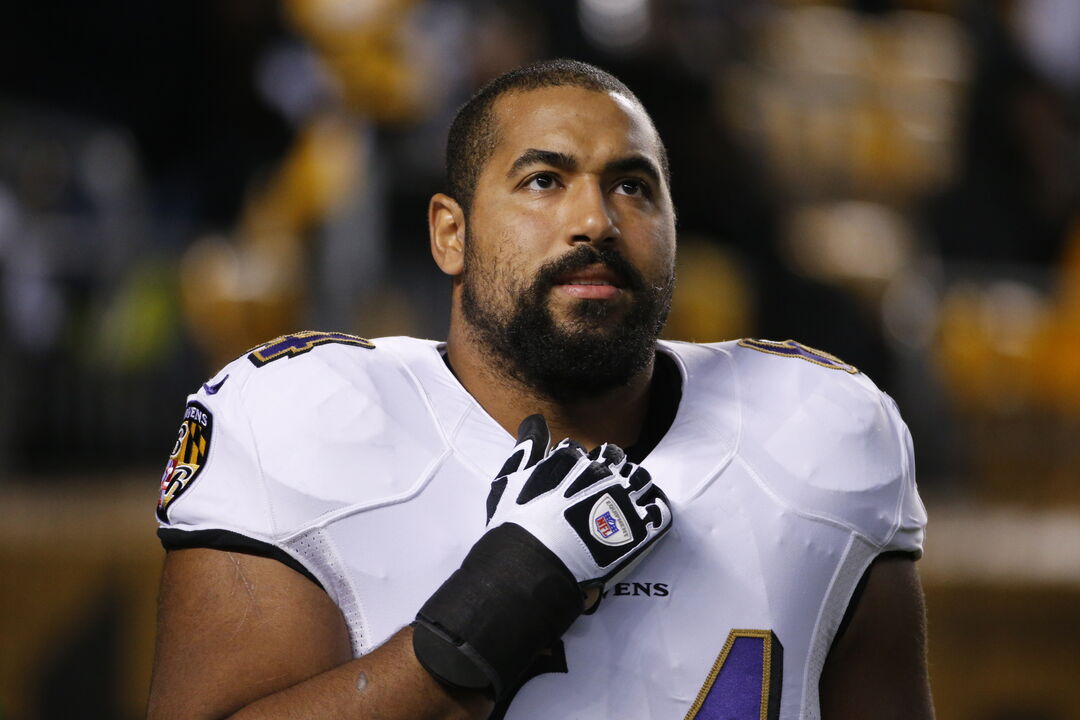 Baltimore Ravens guard John Urschel warms up before an NFL football game against the Pittsburgh Steelers Sunday, Nov. 2, 2014,