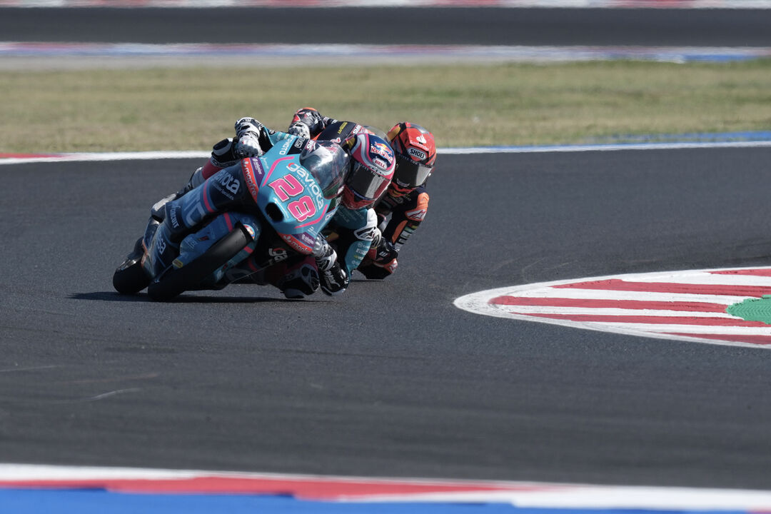 Spain's rider Maximo Quiles of the CFMOTO Valresa Aspar Team steers his motorcycle followed by Spain's rider Brian Uriarte of