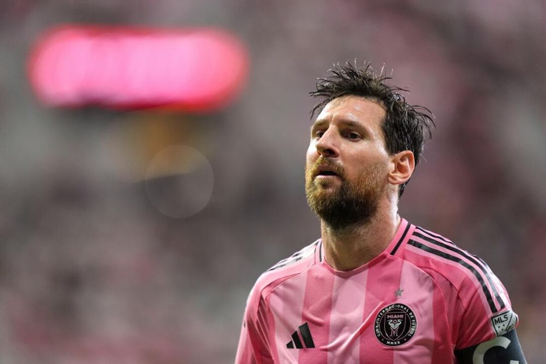 Inter Miami forward Lionel Messi walks on the field during