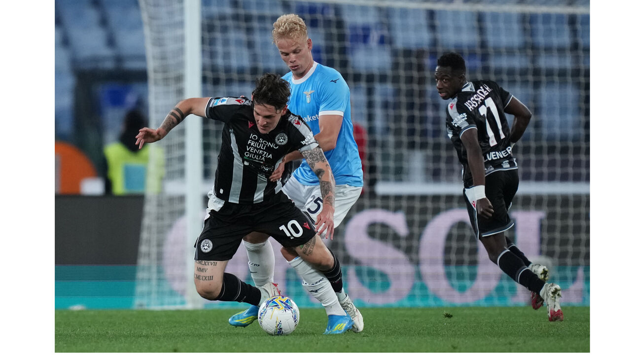Udinese's Nicolo Zaniolo, left, and Lazio's Oliver Provstgaard in action during the Serie A soccer match between Lazio and Udinese