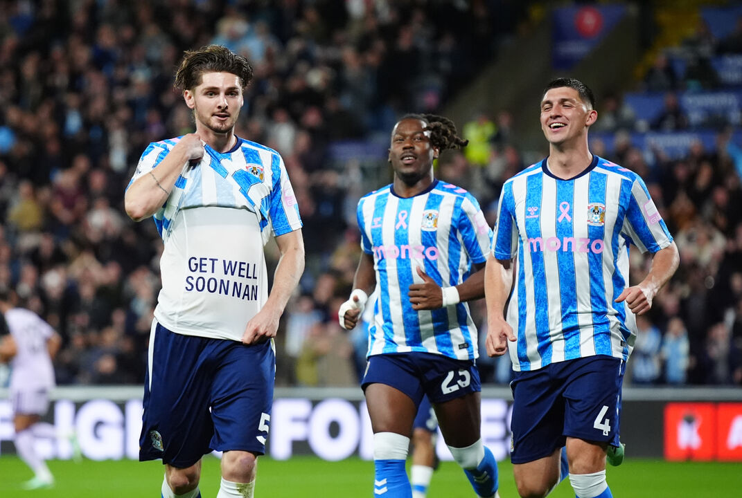 Coventry City's Jack Rudoni, left, celebrates after scoring the opening goal during the English Premier League soccer match between Coventry