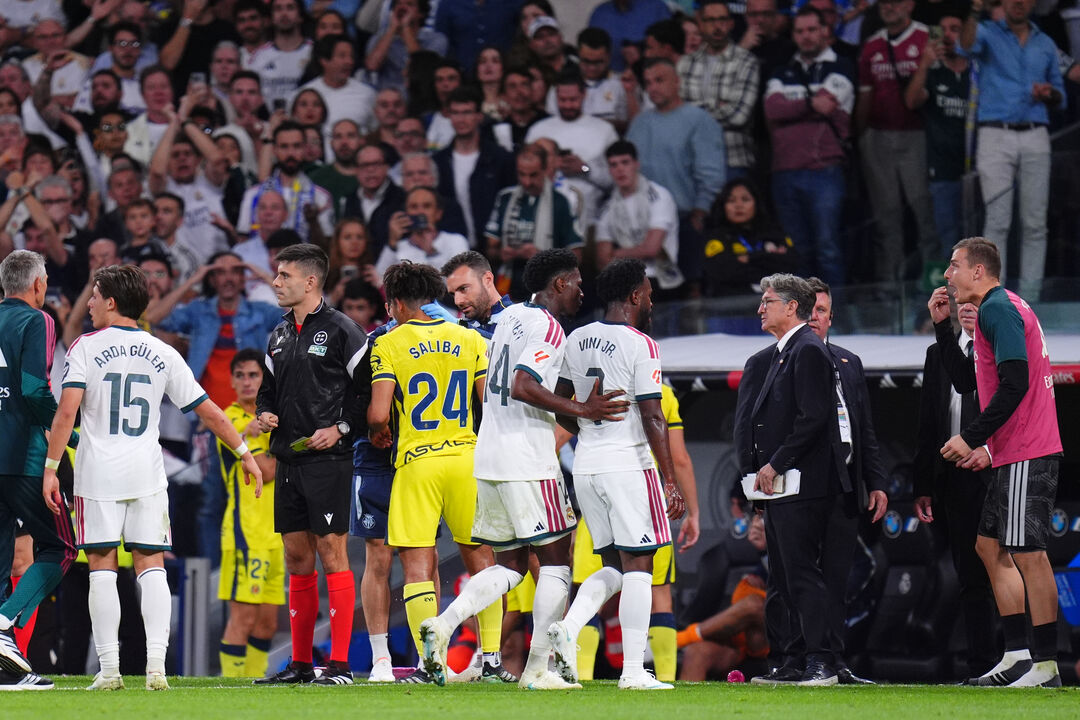 Real Madrid's Vinicius Junior leaves the pitch after being shown a red card during the La Liga soccer match between