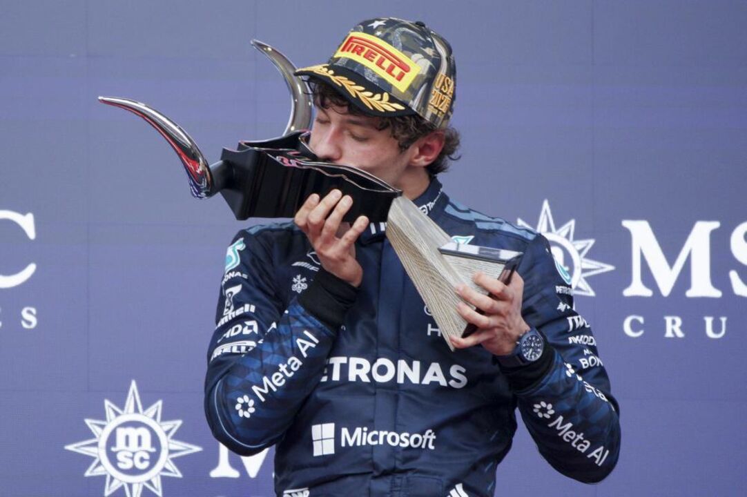 Mercedes driver Andrea Kimi Antonelli of Italy kisses the first