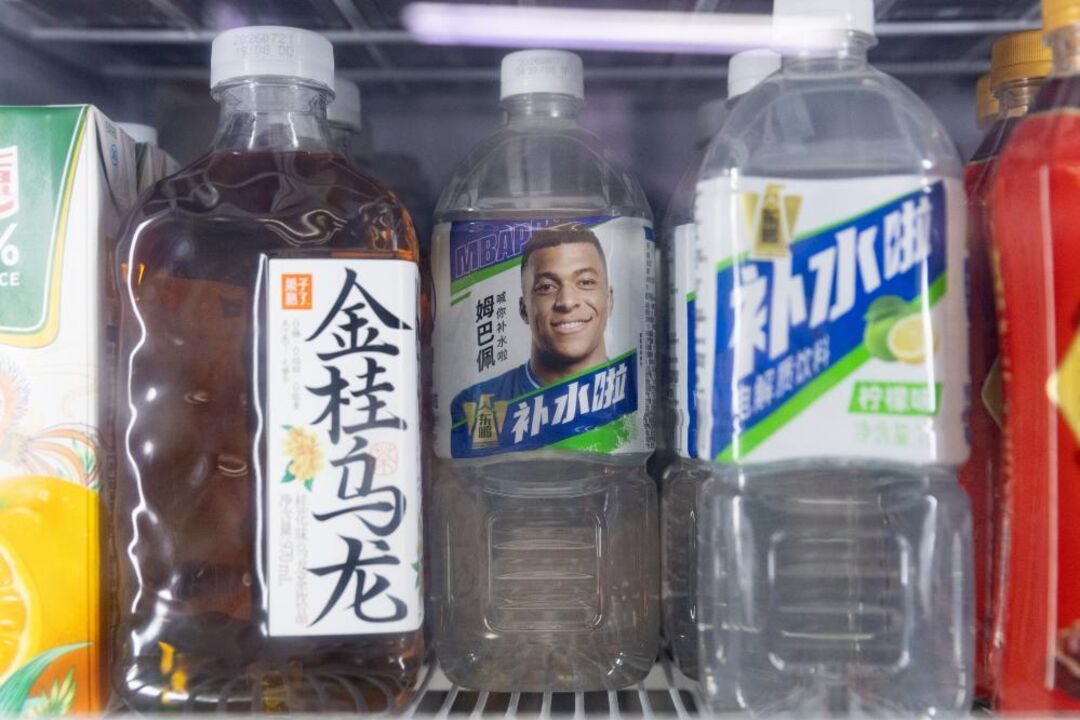 French footballer Kylian Mbappe's image is displayed on a drink
