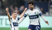 Vancouver Whitecaps' Ryan Gauld, left, and Brian White celebrate Gauld's