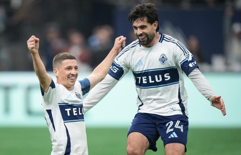 Vancouver Whitecaps' Ryan Gauld, left, and Brian White celebrate Gauld's